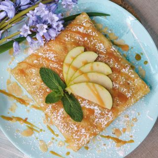 Apple crepe with cinnamon and walnuts