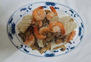 121. Totani con mazzancolle e funghi