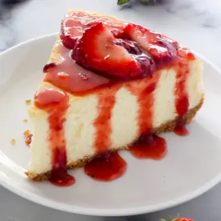 Cheesecake Frutos Rojos  (Porción)