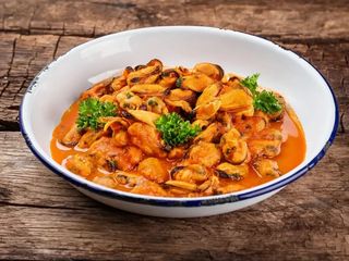 М'ясо мідій в томатному соусі (200g)