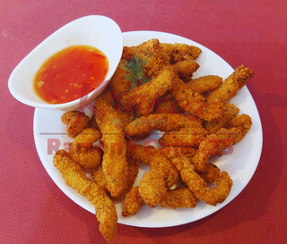 Pollo Cajún crugiente ( tiras de pollo)