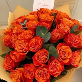 Bouquet des roses oranges naissance garçon 