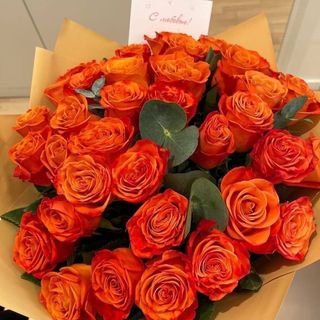 Bouquet des roses oranges naissance garçon 