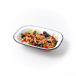 Ensalada templada de pollo en escabeche y queso de cabra