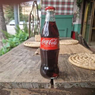 La Coca-Cola classica in vetro 33 cl