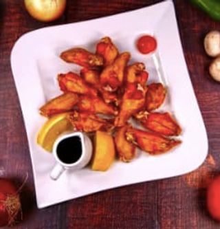 Пилешки крилца в соев сос (300г)