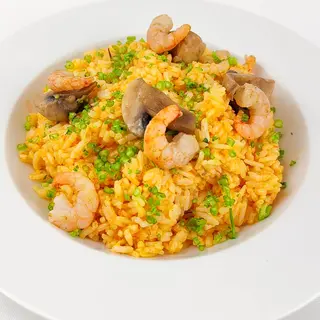 Arroz meloso de gambas y champiñones