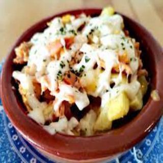 Ración De Patatas Turcas Con Salsa