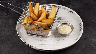 Картопля по-селянськи з розмарином і часником (170/30 г)