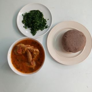 Chicken stew with Brown ugali