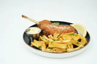 Snitzel din tomahawk de porc