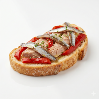 Ventresca con pimientos del piquillo y anchoas de vinarós