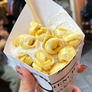 Tortellini fritti con besciamella