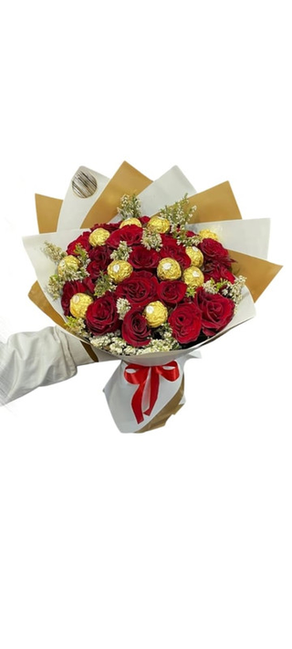 A Bouquet Of Red Roses With Ferrero Rocher Chocolates