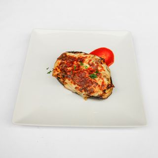 Berenjena rellena de carne gratinada