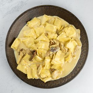 Ravioli con pollo e porcini