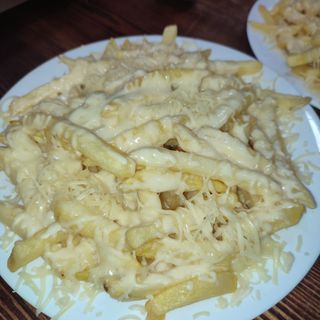 Patatas Con Queso (1 Ración)