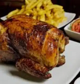 1/2 Pollo A La Brasa Entero Con Salsa Natural