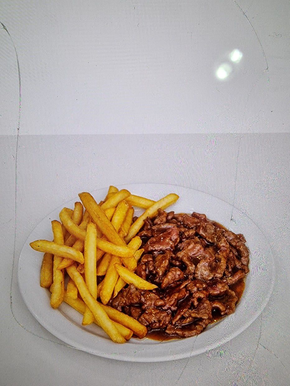 Ternera con patatas fritas