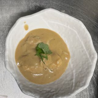 A8. Ravioli in salsa malese