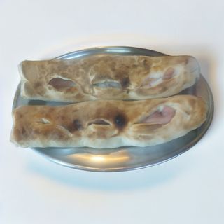 Fagottino con prosciutto cotto, funghi e mozzarella