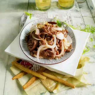 Ternera Con Cebolla