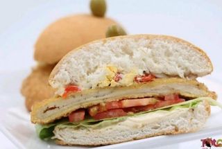 MILANESA MONTEVIDEO AL PAN TERNERA