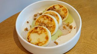 Syrniki with banana cream and matcha mousse