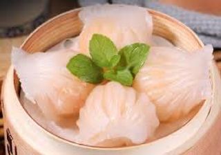 Ravioli con gamberi al vapore