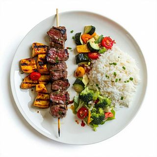 Spiedini di vitello con contorni