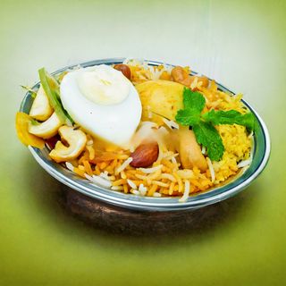 Egg Dum Biryani - Medium Pack (650 ML) + 1 Drink