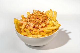 Loaded Fries with bravas sauce, bacon and crispy onion