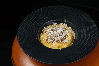 Гуцульський банош з карпатськими прянощами з бринзою та беконом (280г)