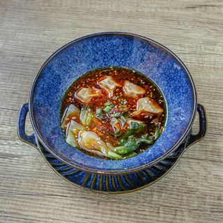 Ravioli di suino alla salsa piccante 6 pezzi
