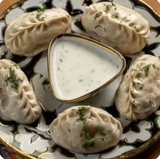 Манты с мясом и тыквой