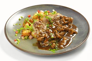 Свински врат със сос от манатарки (350г)