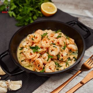 Creveți în sos de vin