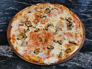 პიცა ზღვის პროდუქტებით (ზღვის პროდუქტები 30 %) 450გრ