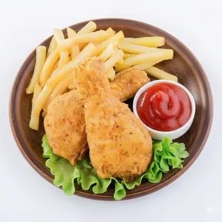 Muslo De Pollo Rebozado Con Patatas