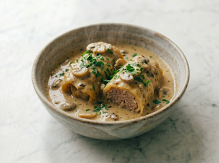 Gołąbki w sosie pieczarkowym