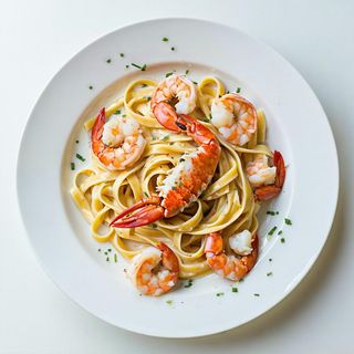 Fettuccine con aragosta e gamberoni