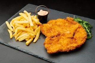 Schnitzel time with fries and sos burgatore