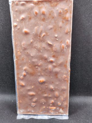 Turrón Artesanal de  Chocolate con Leche y Cacahuetes frito con Miel