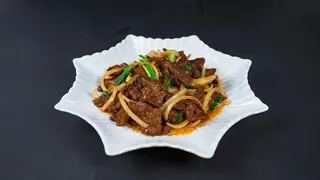 Филе говядины с луком