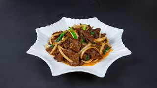 Филе говядины с луком