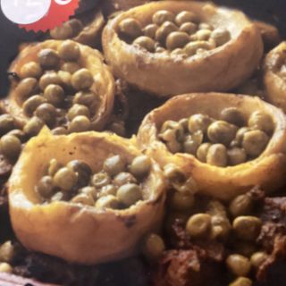 Tajine con il cuore di carciofo e piselli