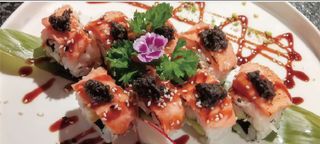 129. Uramaki De Salmón Flameado (8 Pza.)