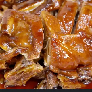 Pato Con Salsa Ciruela