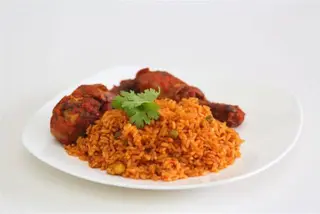 JOLLOF RICE  + PLANTAIN  + FRIED FISH