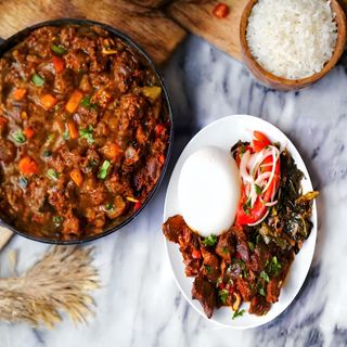 Goat wet fry with ugali and kachumbari